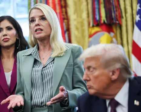 The nation's top prosecutor confronts conservative criticism for vow to target inflammatory rhetoric